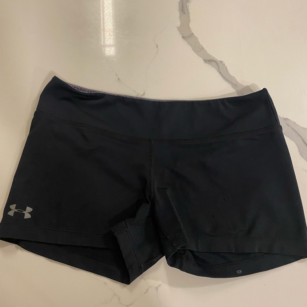Under armour black spandex shorts. Size M.